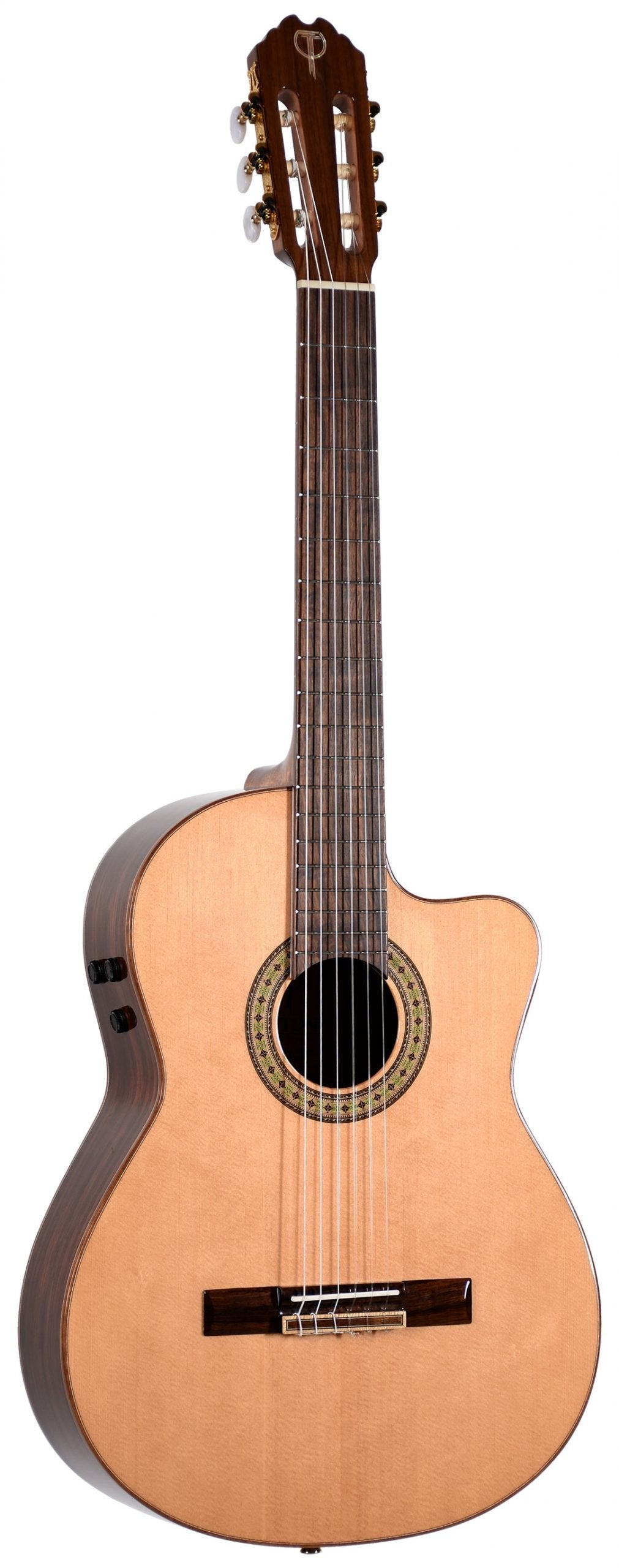 The image shows a classical acoustic-electric guitar with a wide neck, nylon strings, and classical headstock. It features a cutaway body for easy access to higher frets, a natural wood finish with a decorative rosette, and traditional tie-block bridge. Visible side controls indicate built-in electronics, while classical tuning machines complete the design. This guitar suits players seeking warm tones with amplification and full fretboard access.