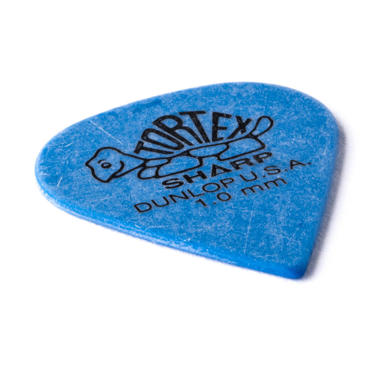 A blue 'Dunlop' branded guitar pick with a turtle design on a white background