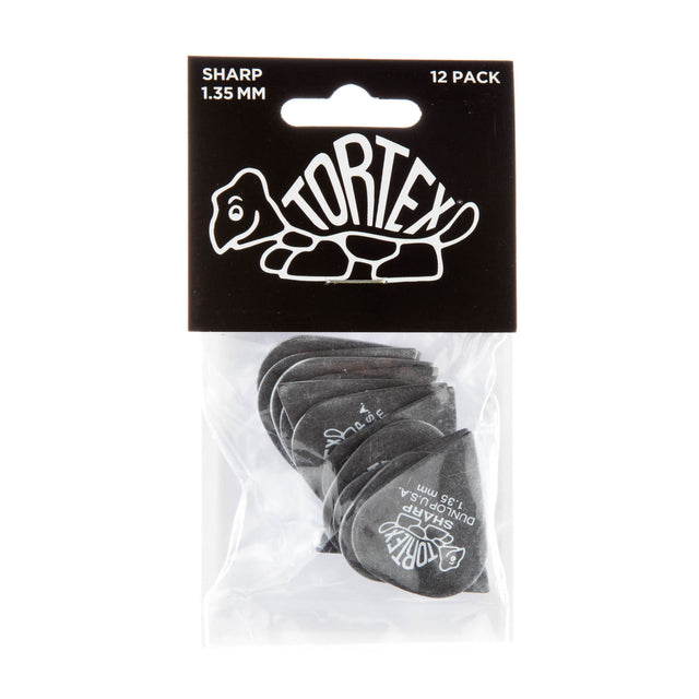 A package with a plastic bag filled with black 'Dunlop' branded guitar picks on a white background