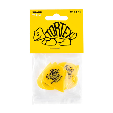 A package with a plastic bag filled with yellow 'Dunlop' branded guitar picks on a white background