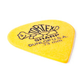 A yellow 'Dunlop' branded guitar pick with a turtle design on a white background