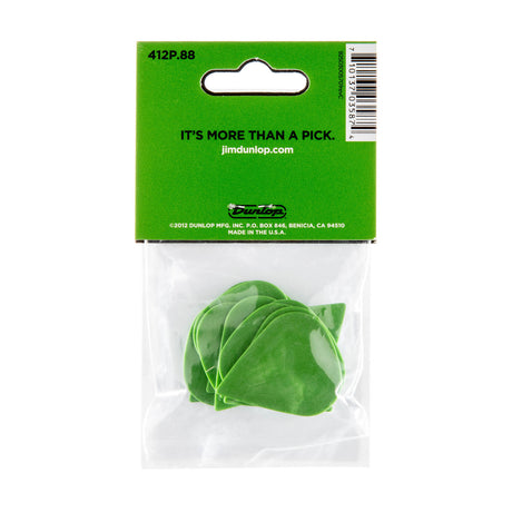 A package with a plastic bag filled with green 'Dunlop' branded guitar picks on a white background