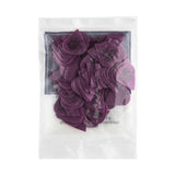 A plastic bag filled with purple 'Dunlop' branded guitar picks on a white background