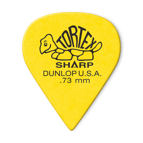 A yellow 'Dunlop' branded guitar pick with a turtle design on a white background