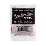 A plastic package filled with red 'Dunlop' branded guitar picks on a white background