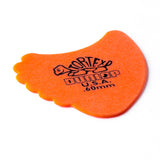 A orange 'Dunlop' branded fin guitar pick with a Tortex turtle design on a white background