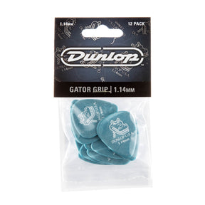 Pack of Dunlop guitar picks with clear plastic packaging on a white background