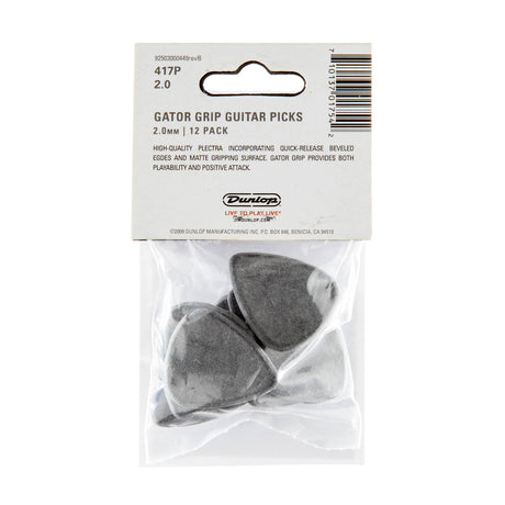 Pack of Dunlop Gator Grip guitar picks with clear plastic packaging on a white background