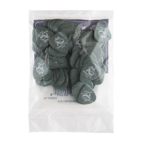 Pack of green guitar picks with a clear plastic bag on a white background