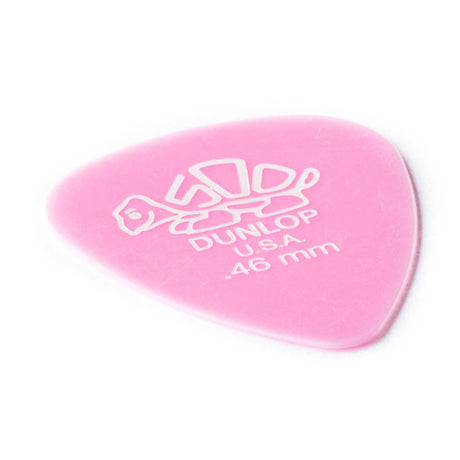 A pink 'Dunlop' branded guitar pick with a turtle design on a white background