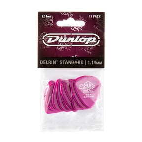 A package of 'Dunlop' purple guitar picks on a white background