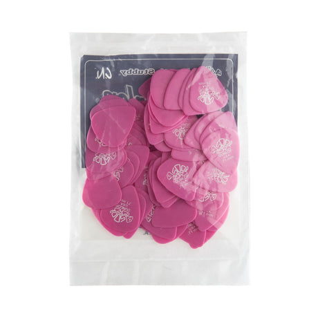 A plastic bag fill with 'Dunlop' branded pink guitar picks on a white background