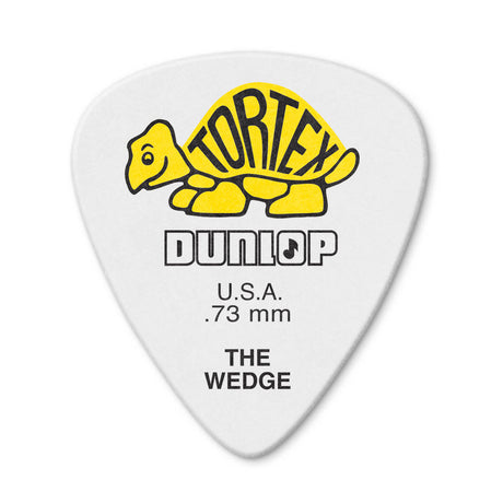 White guitar pick with yellow tortoise logo and Dunlop branding on a white background