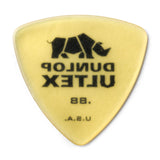 Yellow guitar pick with Dunlop Ultex branding on a white background