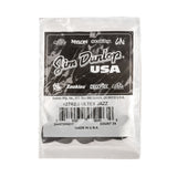 A packaged bag of black guitar picks with Jim Dunlop branding on a white background
