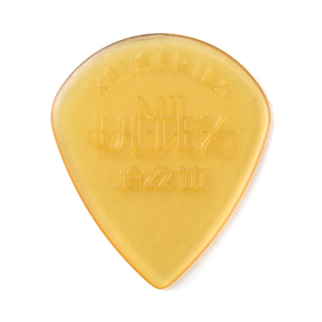 A clear gold guitar pick with Ultex Jazz III XL Series branding on a white background