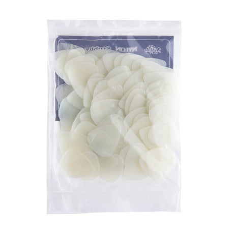 A plastic bag filled with glow in the dark guitar picks from Dunlop
