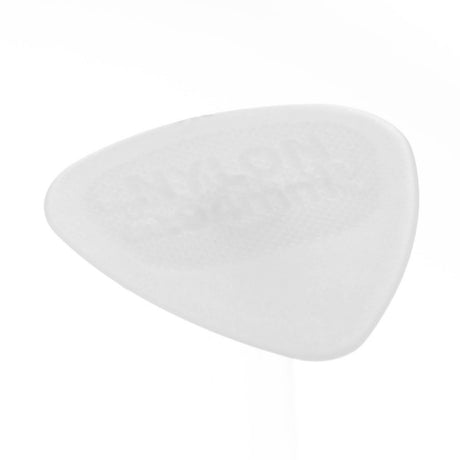 A clear guitar pick on a white background