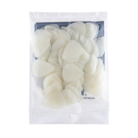 A plastic bag filled with glow in the dark guitar picks on a white background
