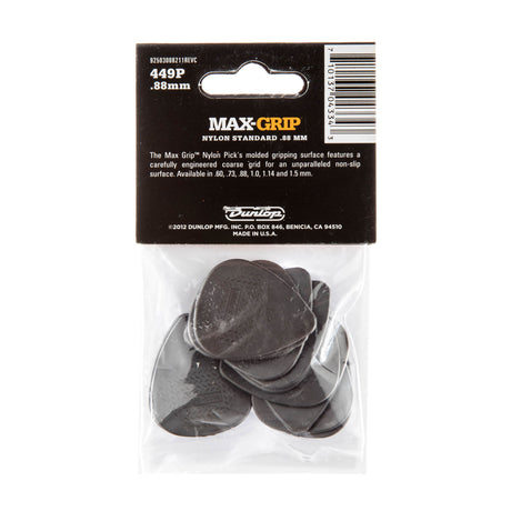 The backside of a package of Dunlop Max-Grip guitar picks with brand details and picks visible inside a plastic bag