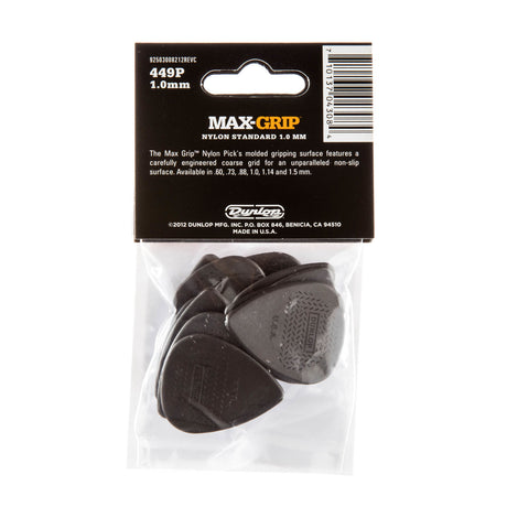 The backside of a package of Dunlop Max-Grip guitar picks with brand details and picks visible inside a plastic bag