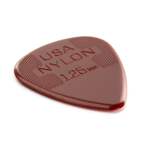 Red guitar pick with 'USA NYLON 1.25 mm' text on a white background