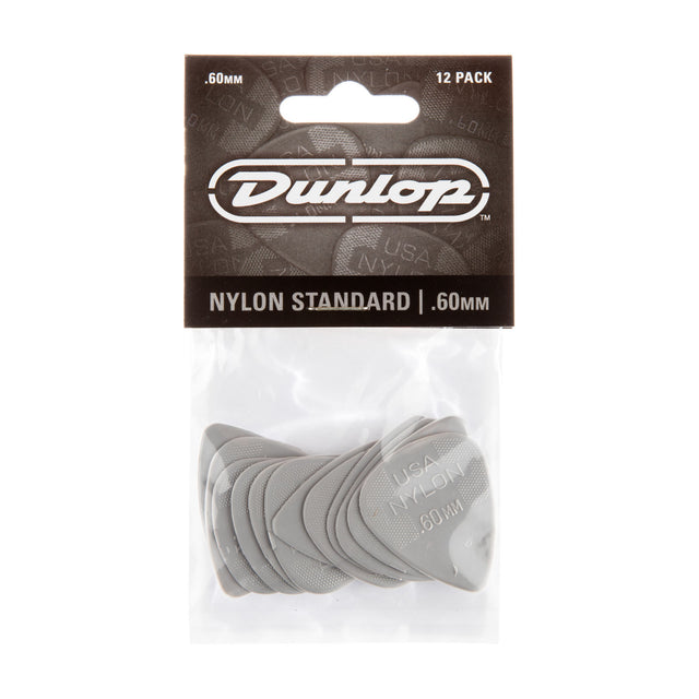 Pack of Dunlop guitar picks with clear plastic packaging on a white background