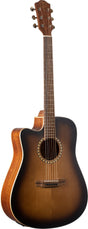 The image shows an acoustic guitar with a single cutaway on the upper bout for easy high-fret access. It has a large dreadnought-style body with a sunburst finish fading from dark edges to a lighter center and warm wood grain on back and sides. The top features a traditional soundhole with a decorative multi-ring rosette. The neck has a dark fretboard with dot markers, chrome tuning pegs on a classic headstock, and a traditional bridge design.