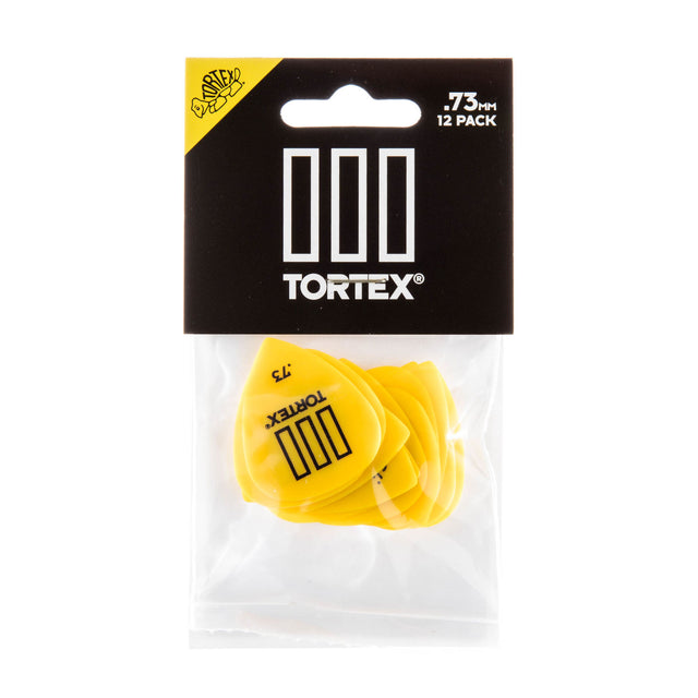 Pack of yellow Tortex guitar picks with clear plastic packaging on a white background