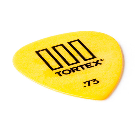 Yellow guitar pick with 'Tortex' branding on a white background