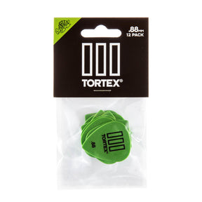 Pack of green guitar picks with Tortex branding on a white background