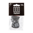 Tortex guitar picks in a clear plastic package with black background