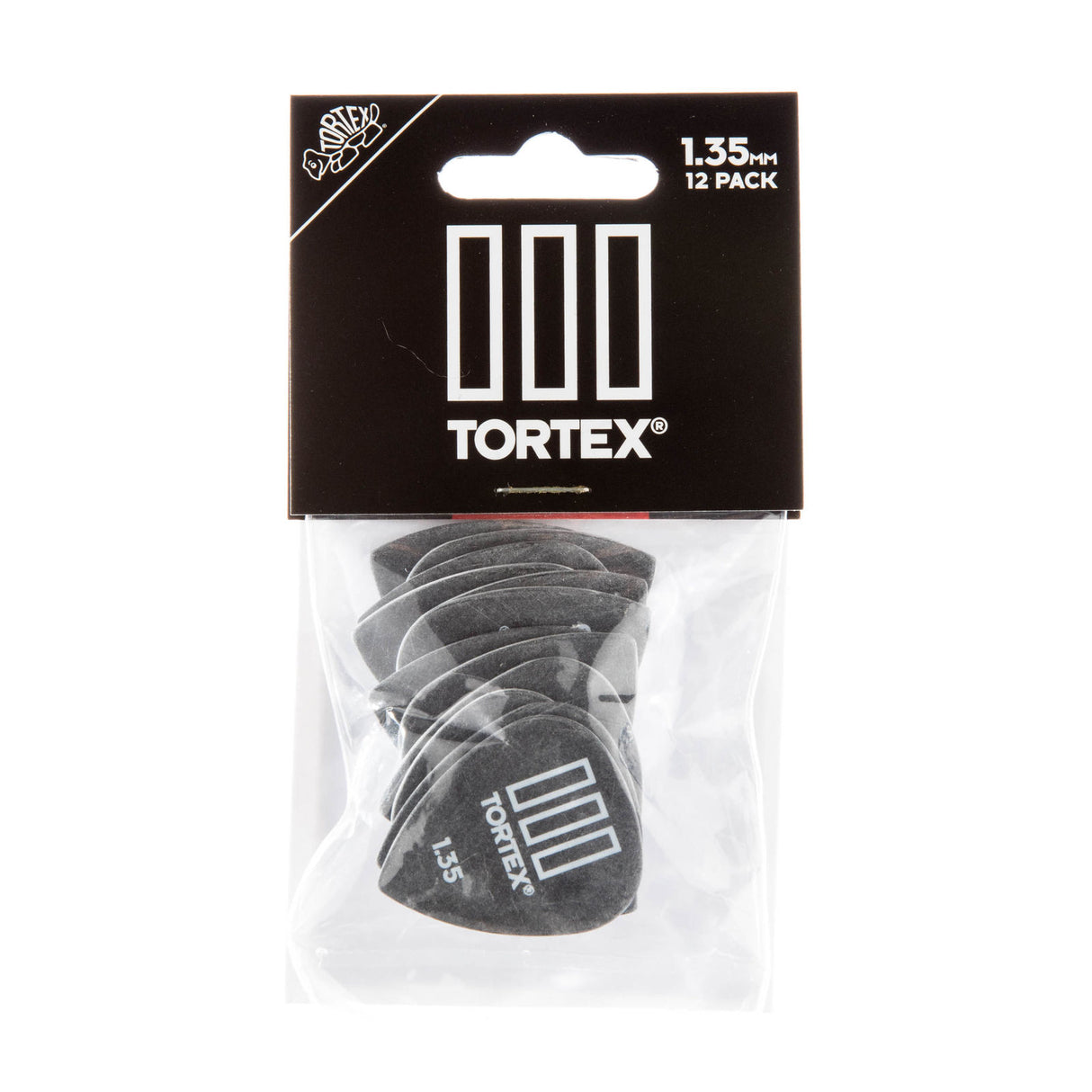 Tortex guitar picks in a clear plastic package with black background