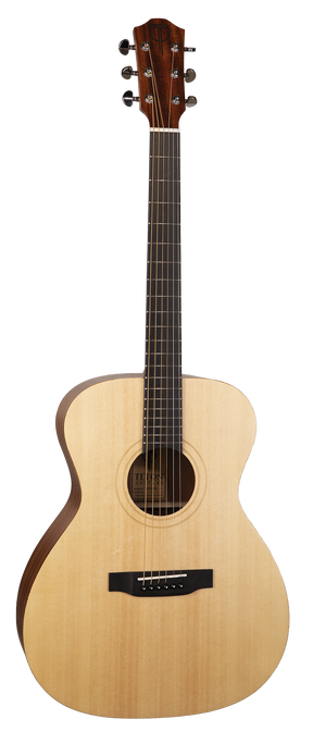 The image shows an acoustic guitar with a natural light wood top, darker wood headstock, and six tuning pegs in a 3+3 layout. It features a dark fretboard with markers, a round sound hole with rosette, a black bridge with a compensated saddle, and steel strings. The guitar has an "OM" body shape, known for balanced, articulate tones, and is photographed on a white background, likely for retail display.