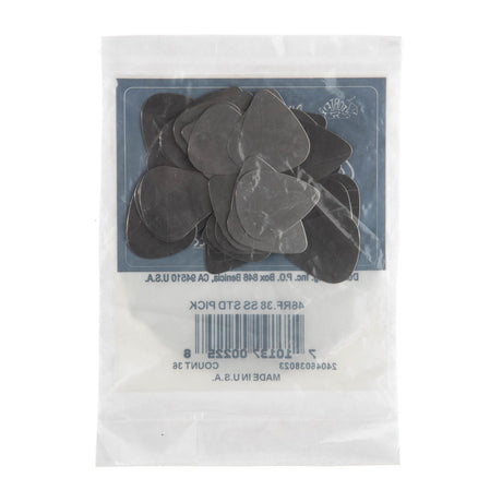 The backside of a bag of guitar picks with picks visible inside