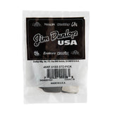 A bag of Dunlop branded guitar picks on a white background