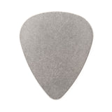 A stainless steel guitar pick on a white background
