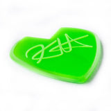 Green guitar pick with a logo on a white background
