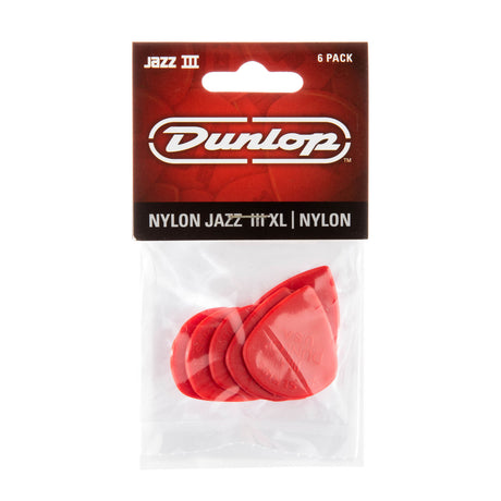 Dunlop guitar pick packaging with red picks inside on a white background