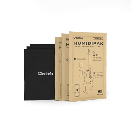 The image shows three kraft paper packages of D'Addario Humidipak Two-Way Humidification System and three black D'Addario-branded storage pouches. This system helps maintain optimal humidity levels in acoustic guitars and wooden stringed instruments, preventing damage from moisture fluctuations. It’s a popular accessory for guitar care, ensuring instrument longevity, playability, and sound quality.