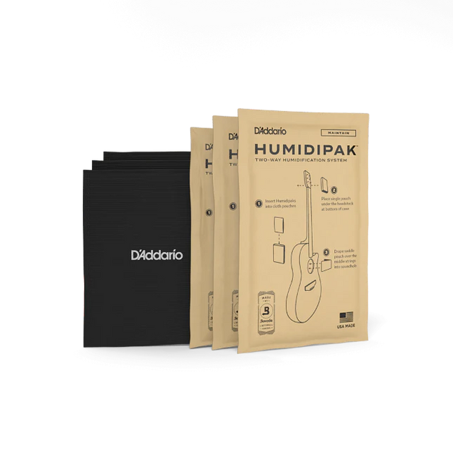 The image shows three kraft paper packages of D'Addario Humidipak Two-Way Humidification System and three black D'Addario-branded storage pouches. This system helps maintain optimal humidity levels in acoustic guitars and wooden stringed instruments, preventing damage from moisture fluctuations. It’s a popular accessory for guitar care, ensuring instrument longevity, playability, and sound quality.