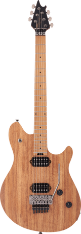 The image shows a solid body electric guitar with a natural light wood finish and contoured curves. It features two black humbucker pickups, a chrome locking tremolo bridge, two control knobs, and chrome tuning machines. The maple neck and fretboard have dot markers, and the black angular headstock holds six chrome tuners in a 3+3 layout. This versatile 6-string guitar suits various styles from clean to high-gain tones.