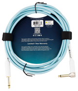 The image shows a Teton TTGC10R guitar cable with a light blue braided exterior, gold-plated 1/4" connectors (one straight, one right-angle), and a 6.5mm jacket. It is marketed for noise-free, clear sound and affordable quality, backed by a 1-year warranty. Packaging includes a barcode, QR code, social media info, CE mark, and states it is made in China. Suitable for connecting guitars or basses to amps and pedals.