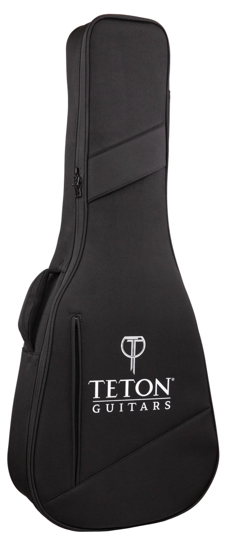 The image shows a black Teton Guitars soft guitar gig bag with a textured fabric surface, white Teton logo and brand name, and a "T" logo at the top. It features diagonal accent stripes, a full-length zipper, and padded shoulder straps. Designed for acoustic guitars, it offers lightweight, portable protection with a sleek, professional look.