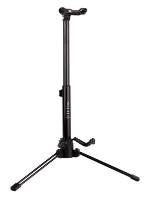 The image shows a black professional-grade tripod guitar stand with an adjustable central pole, three folding legs for stability, an upper cradle for the guitar neck, and a lower arm to support the body. The brand "DELTON" is visible on the pole. This sturdy, height-adjustable stand is used by guitarists to securely display and store acoustic or electric guitars in studios, on stage, or at home.
