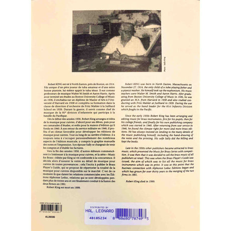 Book back cover with text and a photo of a person at a desk.