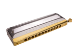 The image shows a chromatic harmonica with a gold/brass metal comb and a silver/chrome cover plate numbered 1-12 for hole identification. It features a side slide mechanism that enables access to sharps and flats, allowing all 12 chromatic notes. This advanced instrument, used in jazz and classical music, offers full chromatic capability and appears to be a professional or semi-professional model.