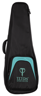 The image shows a TETON UKULELES black soft-shell ukulele gig bag with turquoise/teal accents on the front pocket. It features the TETON logo and "UKULELES" text, multiple zippers, a side handle, and padded construction for protection. This lightweight, portable case is designed to safeguard the instrument from minor bumps and weather, offering a professional look likely bundled with or sold for TETON ukuleles.