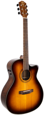 The image shows an acoustic-electric guitar with a sunburst finish and a cutaway body for easier fret access. It features steel strings, a dark fretboard, chrome tuning machines, and a "T" logo on the headstock. Visible control knobs indicate built-in electronics for amplification. The guitar combines classic acoustic design with versatile playability, popular among performers needing both natural sound and plug-in capability.