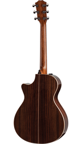 The image shows the back of a high-quality acoustic-electric guitar with rich dark wood grain, likely rosewood, and light-colored binding. It features a cutaway body, chrome tuning pegs (six, three per side), and visible electronics for amplification. The vertical wood grain and classic steel-string construction highlight its professional-grade design for both acoustic and amplified playing.